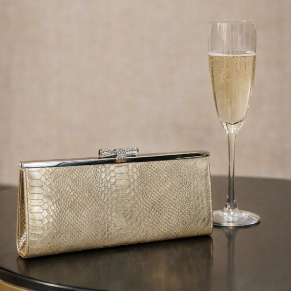 INC International Concepts Handbags - INC International Concepts "Carolyn" Gold Snake Print Rhinestone Bow Clutch NWOT